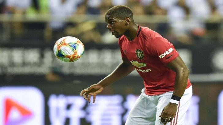 Paul Pogba playing for Manchester United